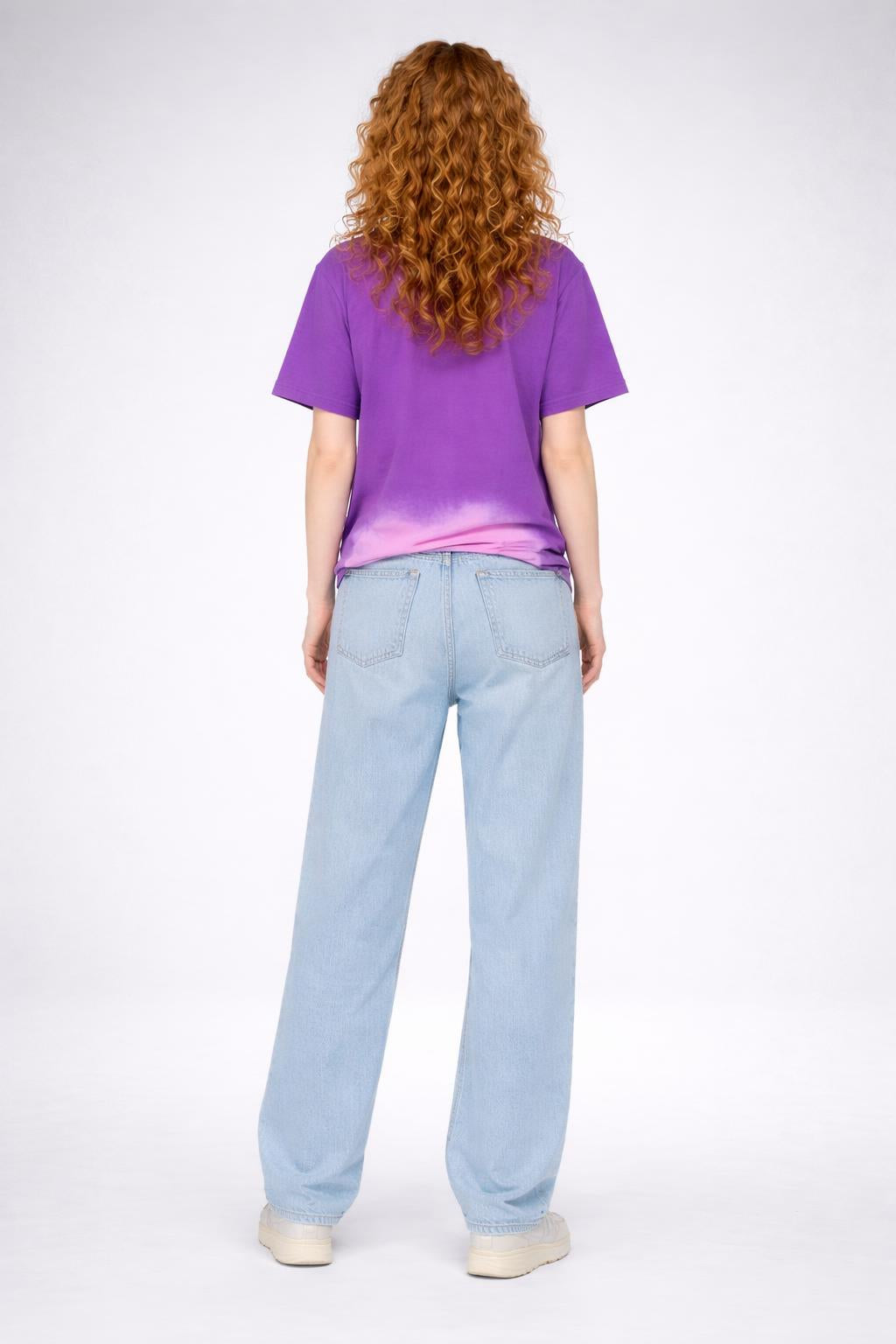 Back pose of the model wearing Worship-Inspired Apparel Tee