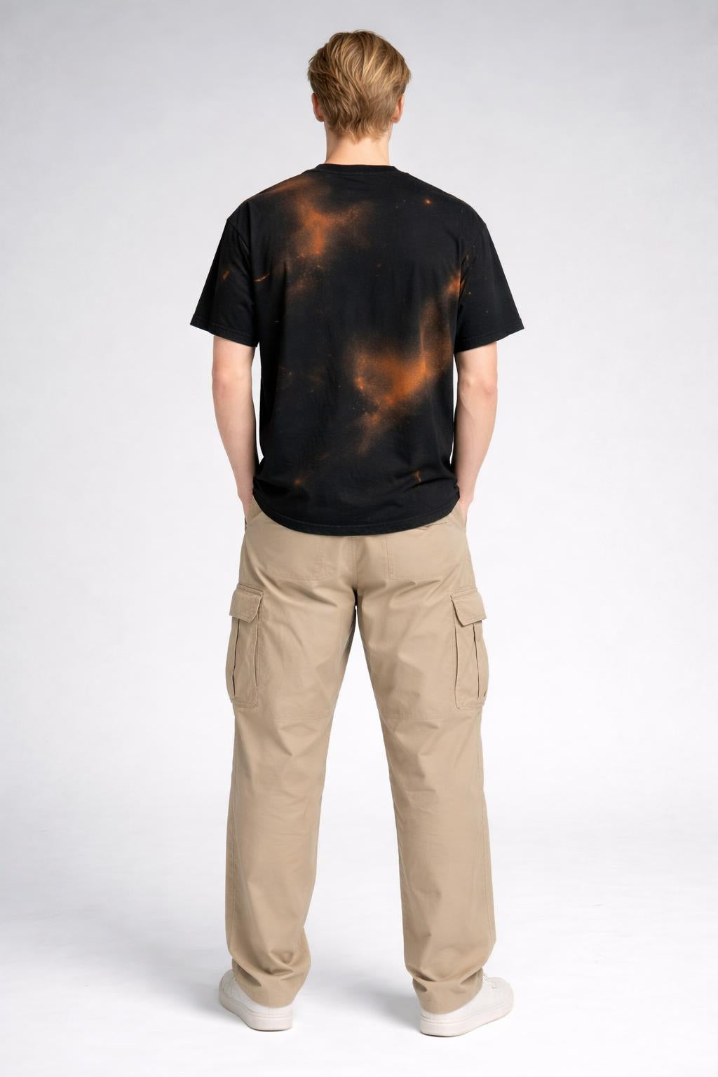 Back pose of the model wearing Redeemed Radiance Tee