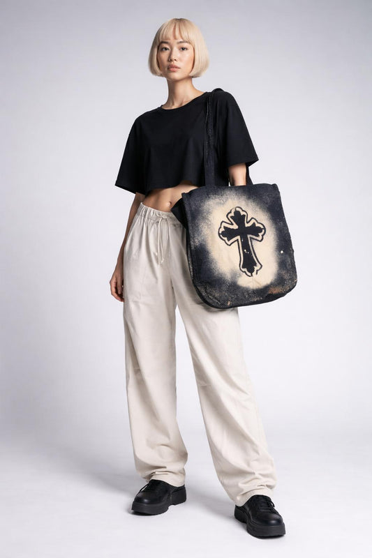 Full body view of the model wearing Large Cross Tote Bag
