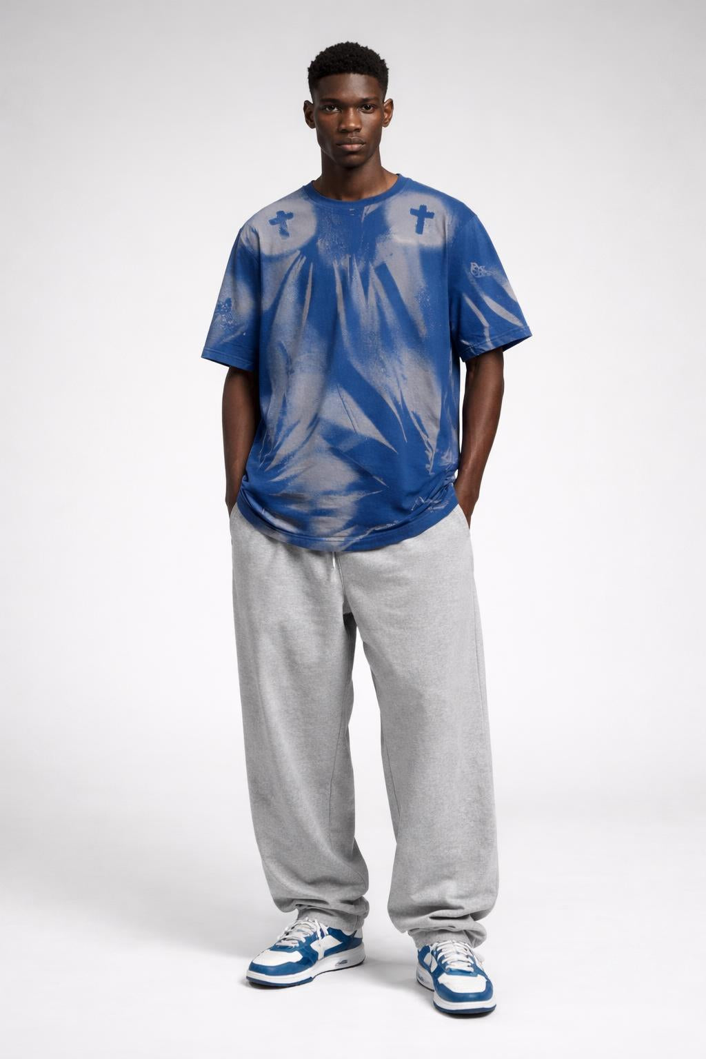 Full body view of the model wearing Worship-Inspired Apparel Tee