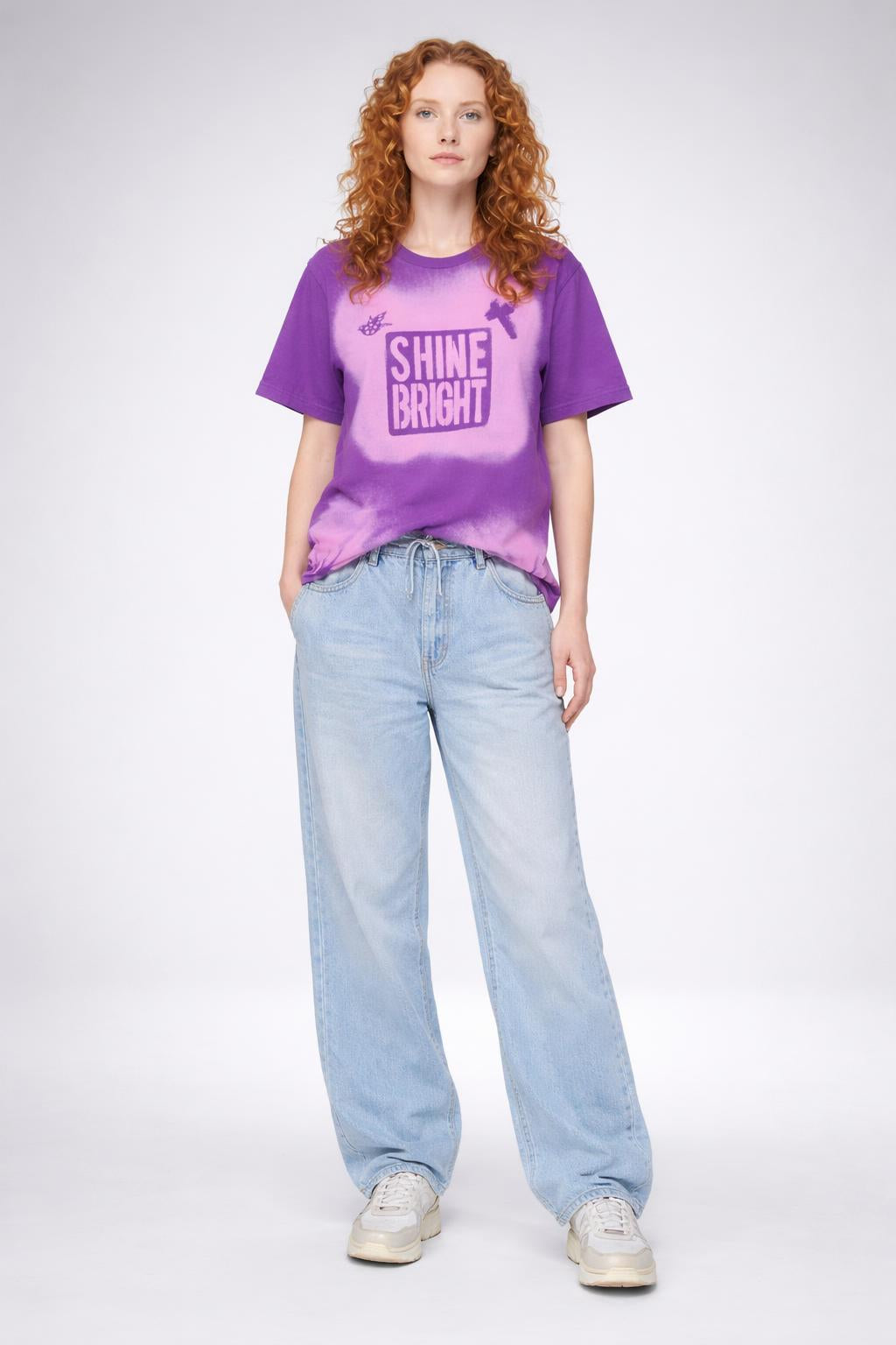 Full body view of the model wearing Worship-Inspired Apparel Tee